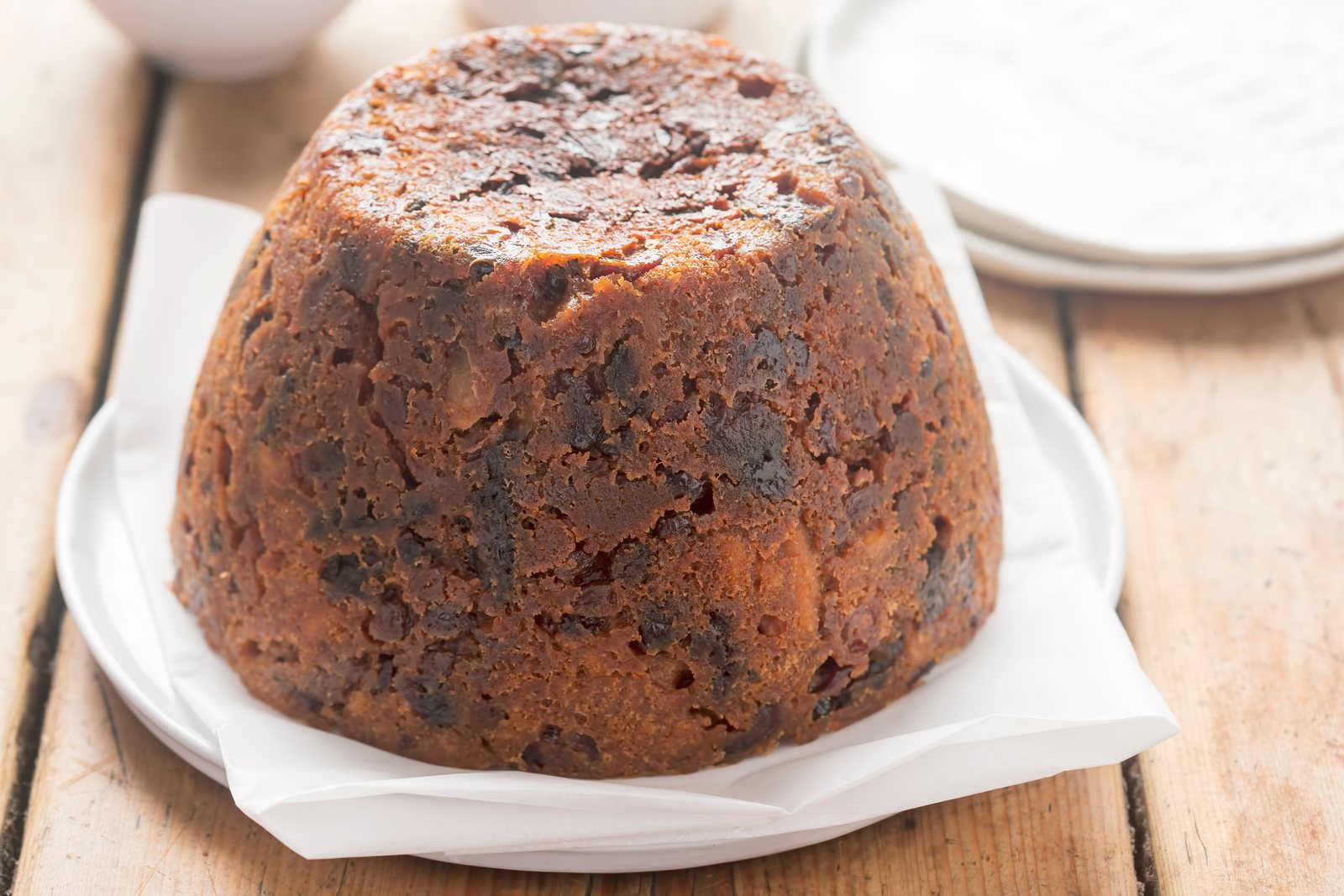 A Christmas pudding turned out of its basin