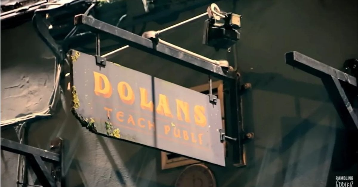 Musicians playing traditional Irish music at a trad session in a pub, with fiddle and accordion