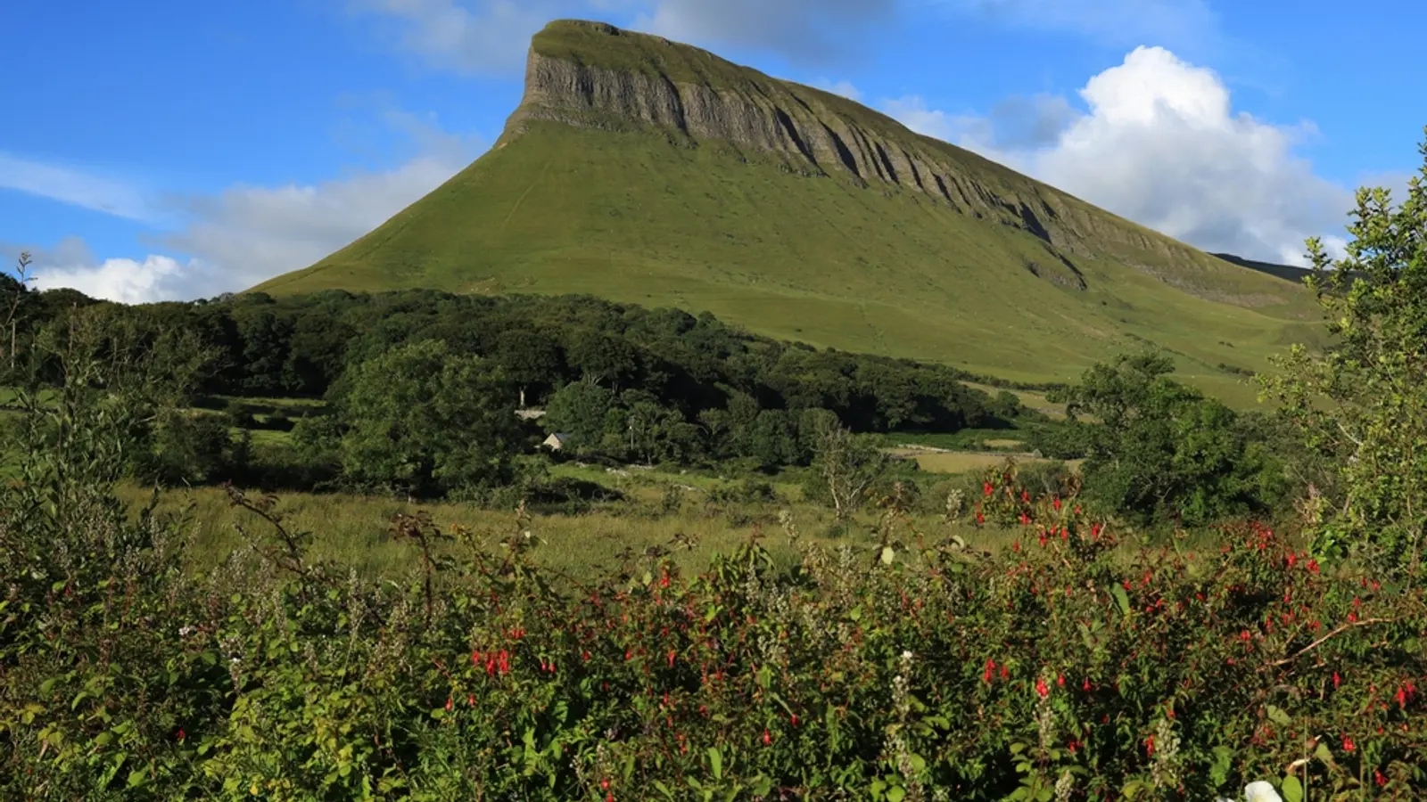 Benbulben mountain rising above the lush green countryside of County Sligo and Leitrim, Ireland