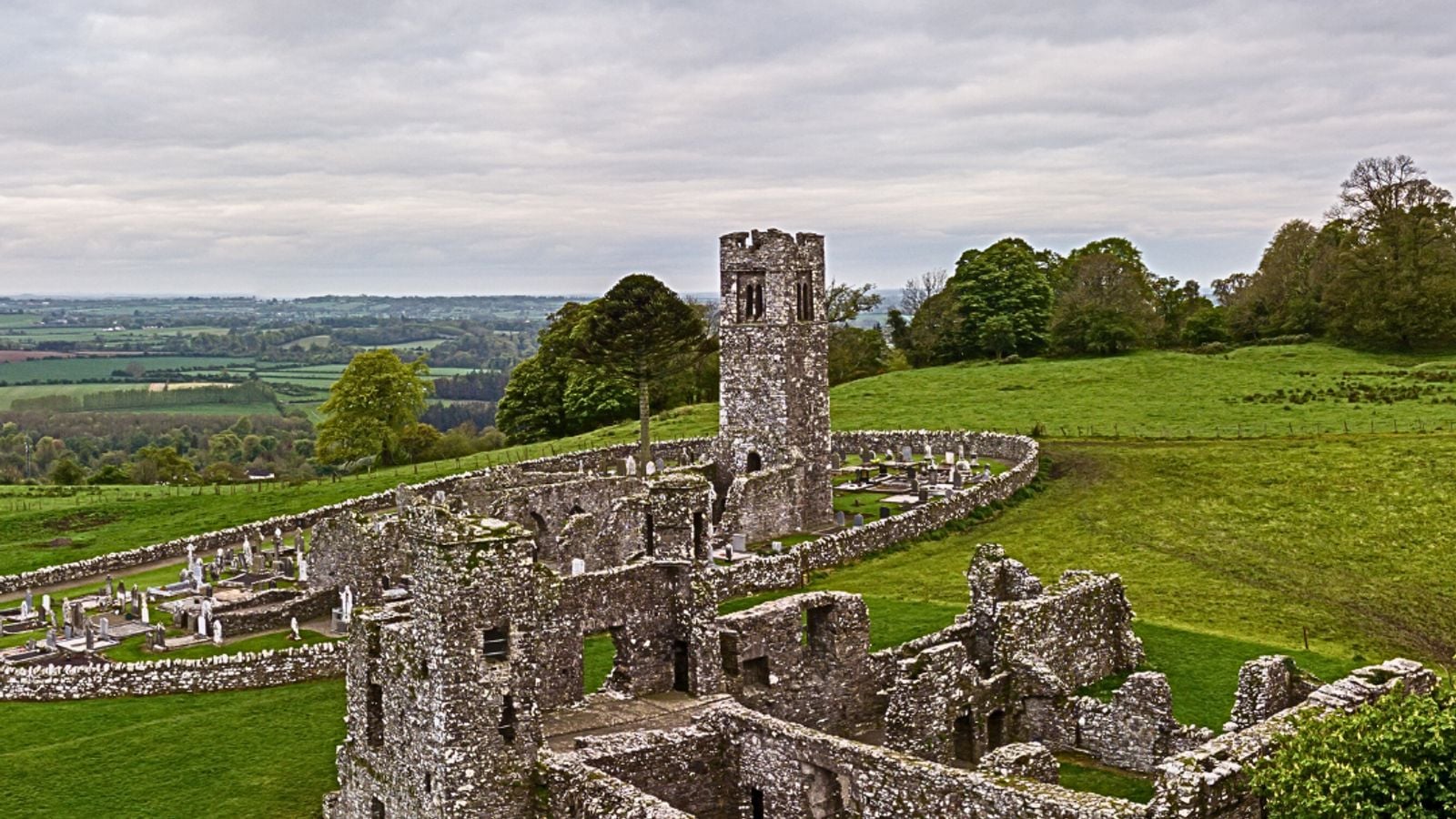 Ancient stone ruins and round tower on the Hill of Slane, County Meath, Ireland, associated with the Bealtaine fire festival