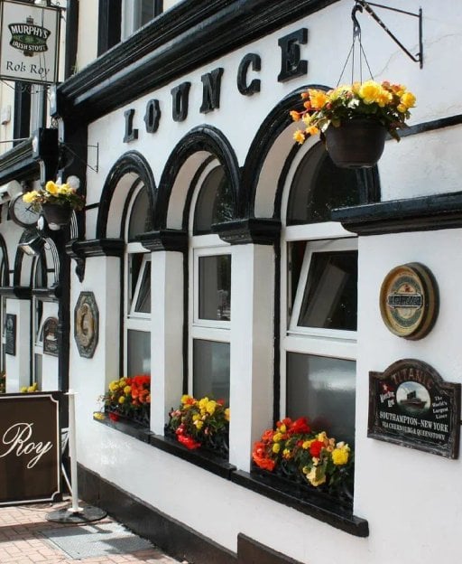 A busy, welcoming Irish pub interior with locals enjoying the atmosphere