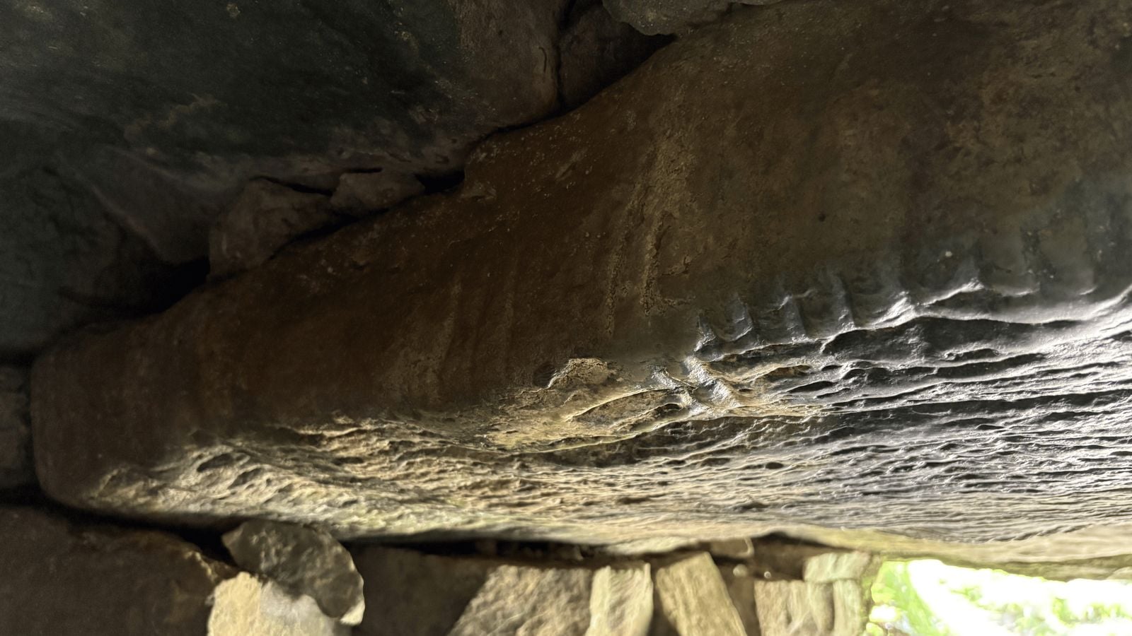 Ogham stone at Oweynagat Cave of Cats, County Roscommon, carved with ancient Irish inscriptions