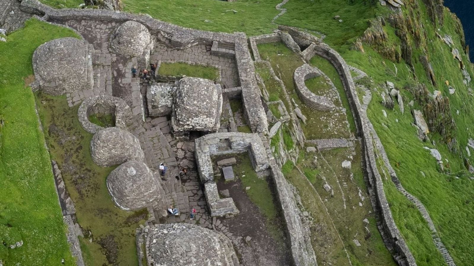 Stone beehive huts at the ancient monastery on Skellig Michael island, County Kerry, Ireland