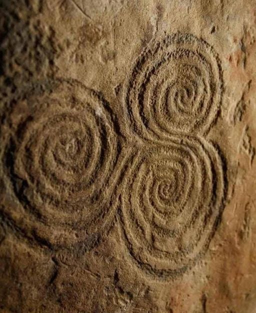 The triple spiral carved inside the Newgrange passage tomb, County Meath