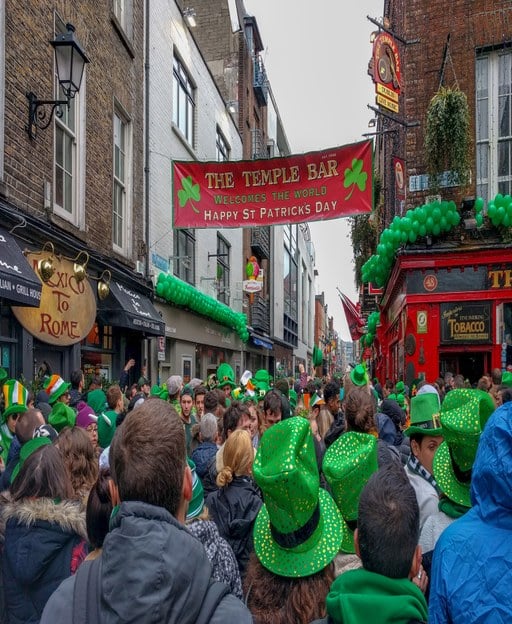 Crowds celebrating St Patrick's Day at Temple Bar in Dublin, Ireland