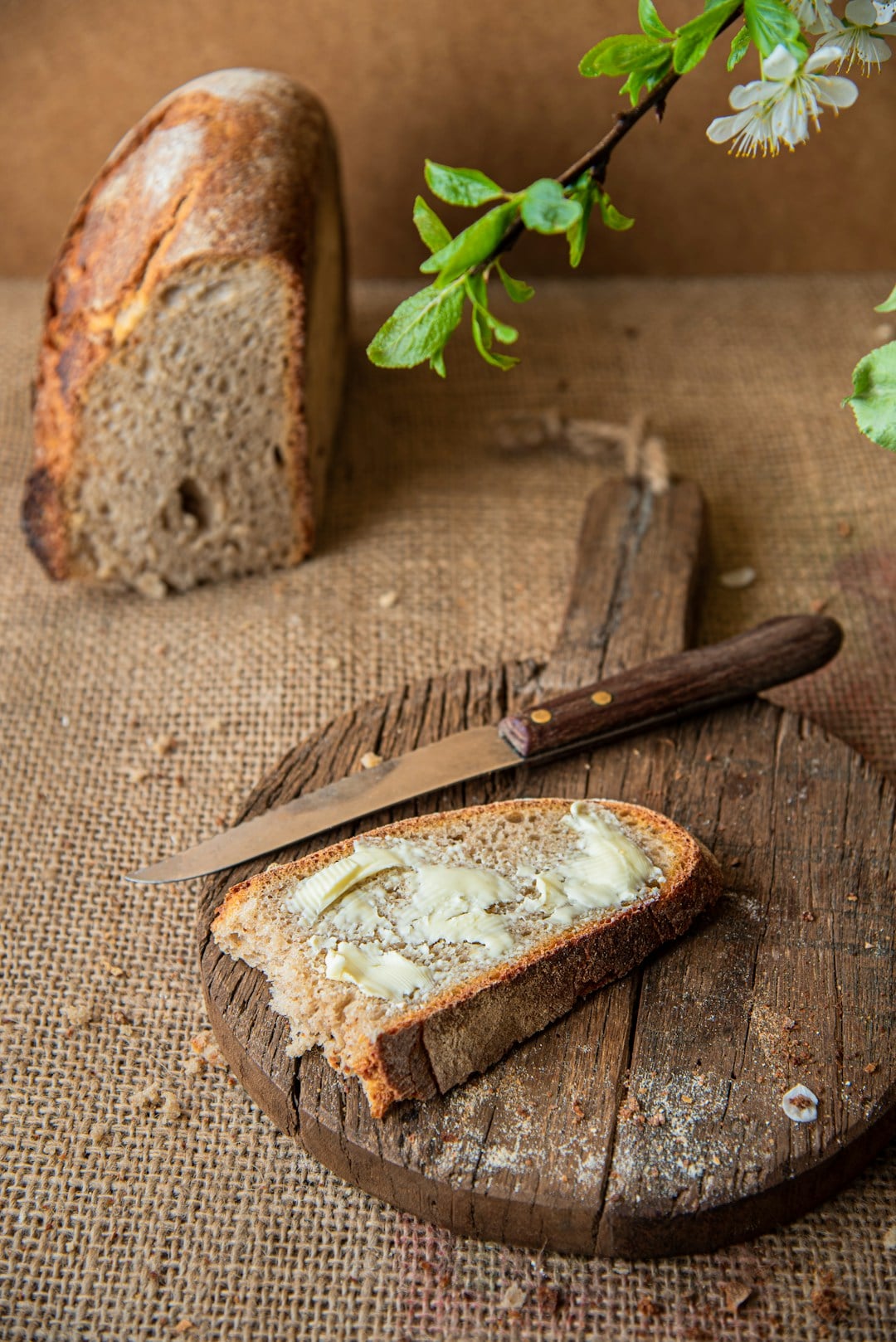 Traditional butter spread on rustic bread &mdash; the kind of butter that has been made in Ireland for thousands of years
