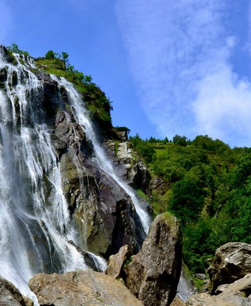 Powerscourt Waterfall cascading through the forest in Wicklow