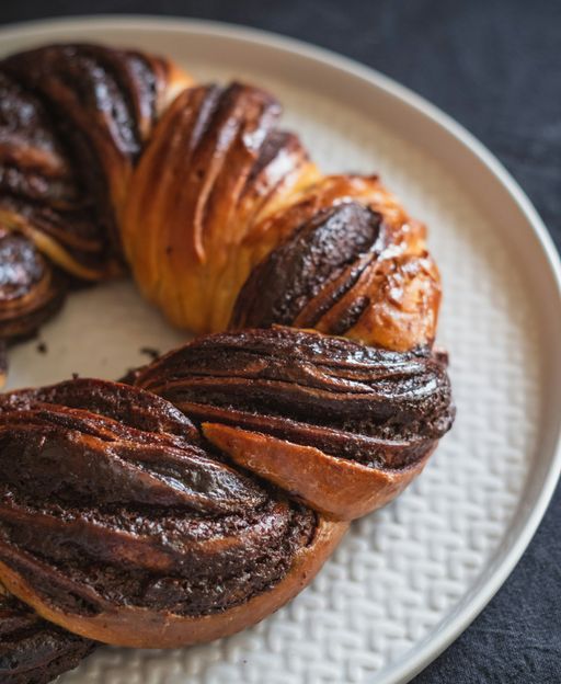 Chocolate brioche twists &mdash; enriched dough with rich chocolate swirls, golden and glossy from the oven