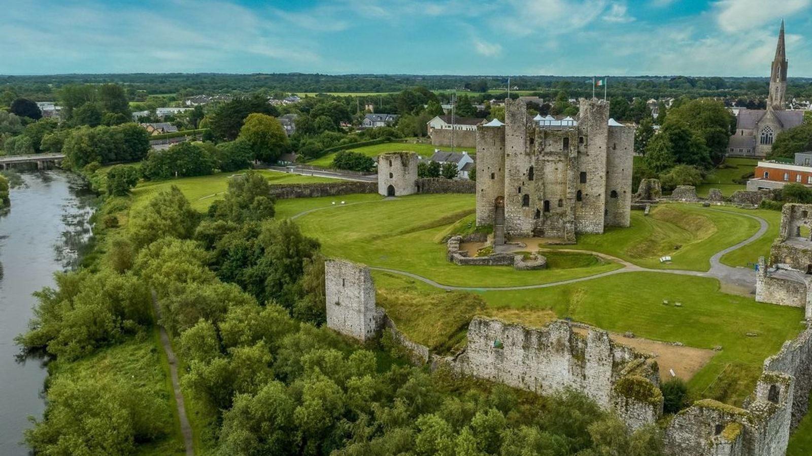 Aerial view of Trim Castle in County Meath, the largest Anglo-Norman castle in Ireland, surrounded by green fields and the River Boyne