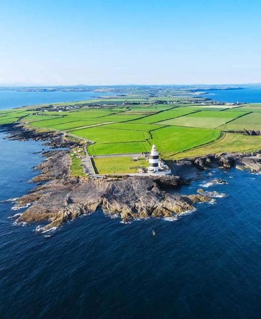 Aerial view of Hook Lighthouse on the Hook Peninsula, County Wexford &ndash; one of the oldest working lighthouses in the world, standing at the tip of the Redmond family heartland
