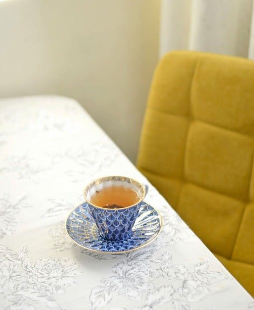 A cup of tea on a china saucer &mdash; the centrepiece of Irish hospitality