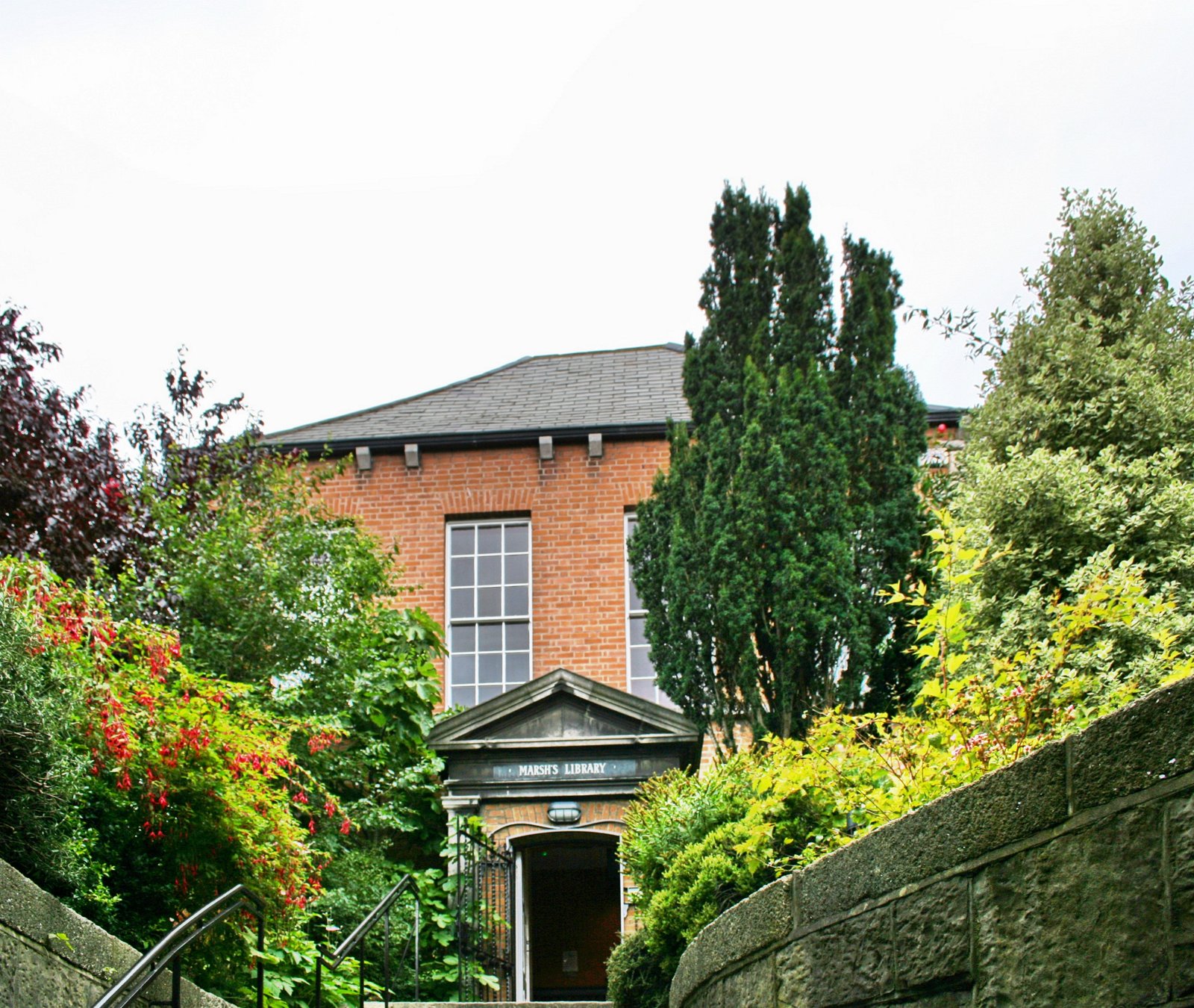 Marsh's Library exterior entrance &mdash; red brick 18th-century library near St Patrick's Cathedral, Dublin