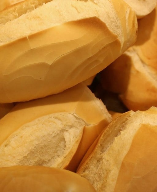 Soft freshly baked white yeast bread rolls with a golden crust and airy crumb, the kind of light bread you can make at home with this Vienna bread recipe