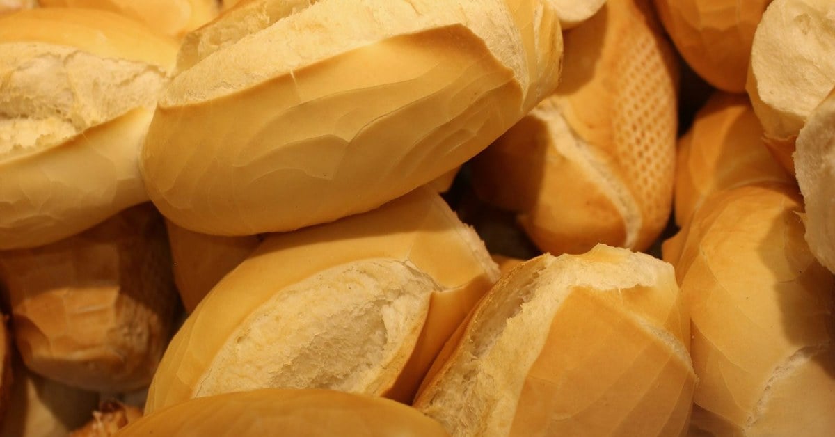 Golden-crusted soft yeast bread rolls with white airy interior, freshly baked in an Irish kitchen