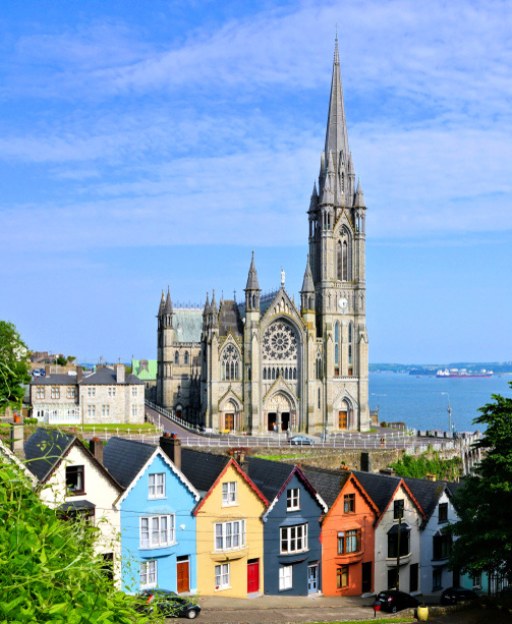St Colman's Cathedral rising above the colourful terraced houses of Cobh, County Cork, Ireland