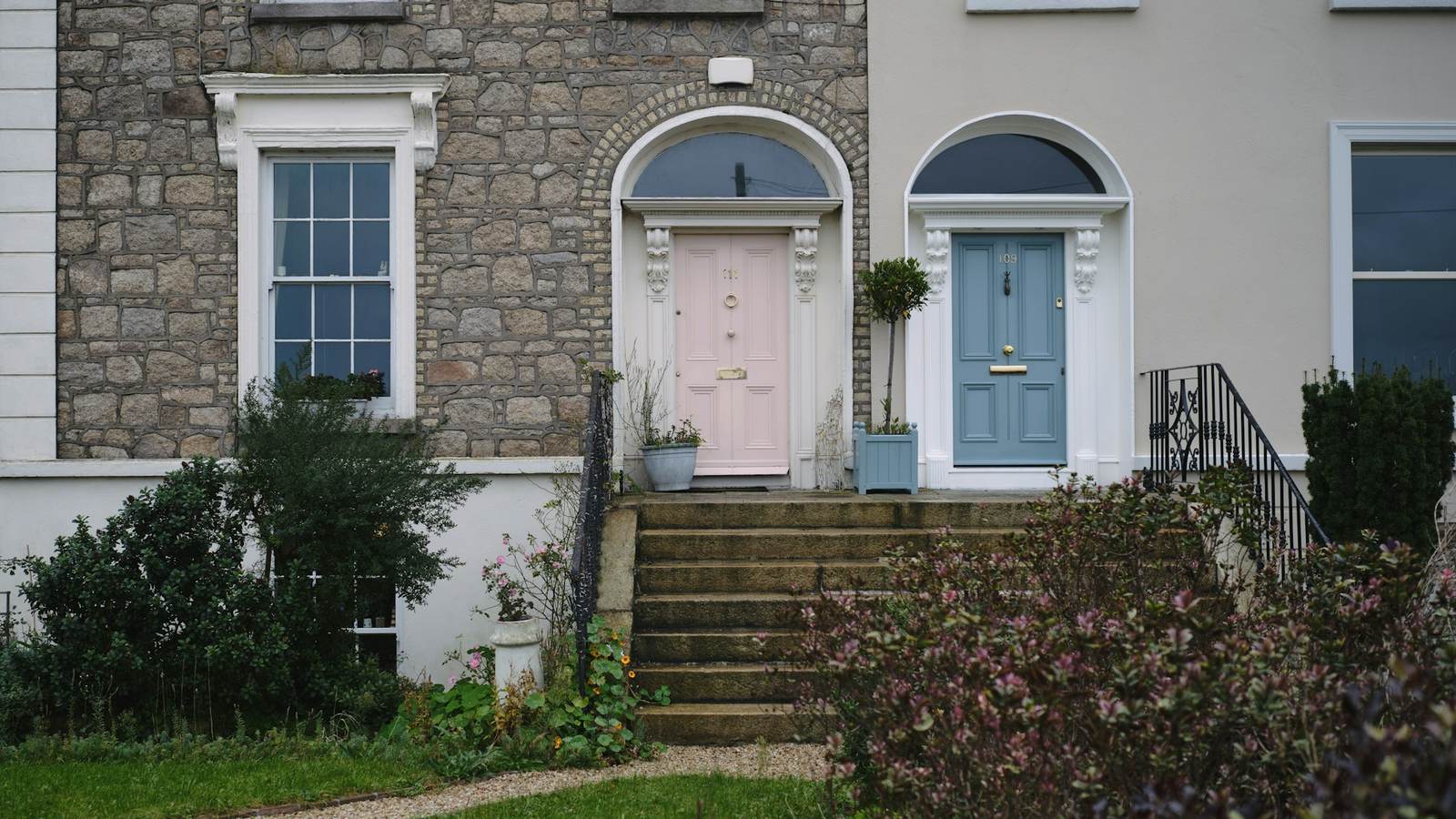 Colourful painted doorway on a Georgian townhouse facade in Sandymount village, Dublin, Ireland