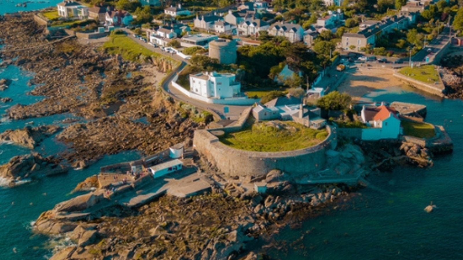Aerial view of the Forty Foot swimming area and D&uacute;n Laoghaire coastline in Ireland