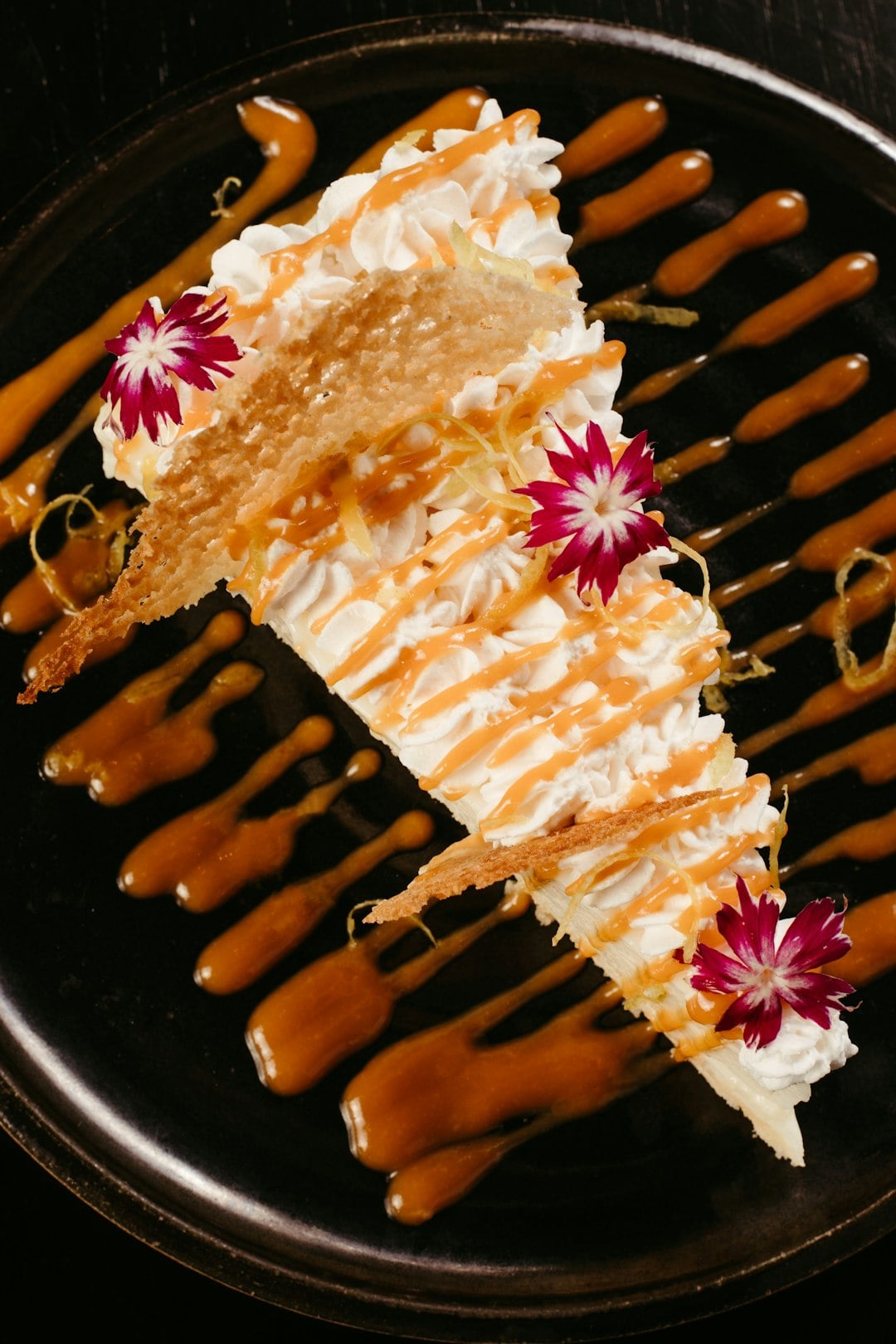 Lazy Daisy Cake with caramel coconut topping on a plate