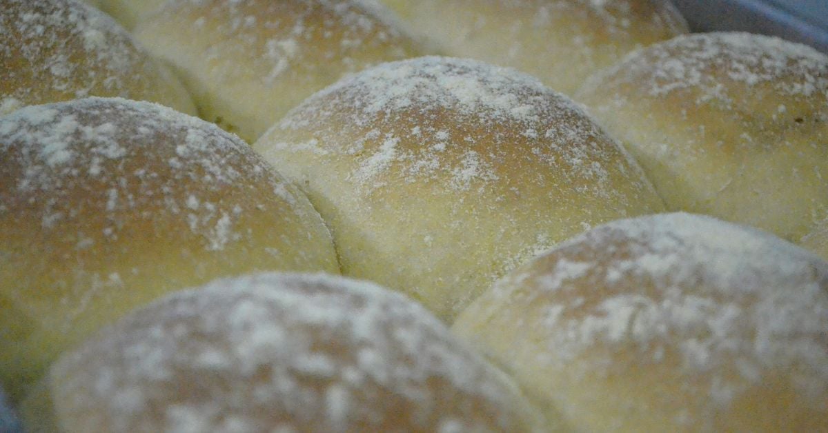 Freshly baked soft flour-dusted bread rolls &mdash; the iconic Waterford blaa recipe
