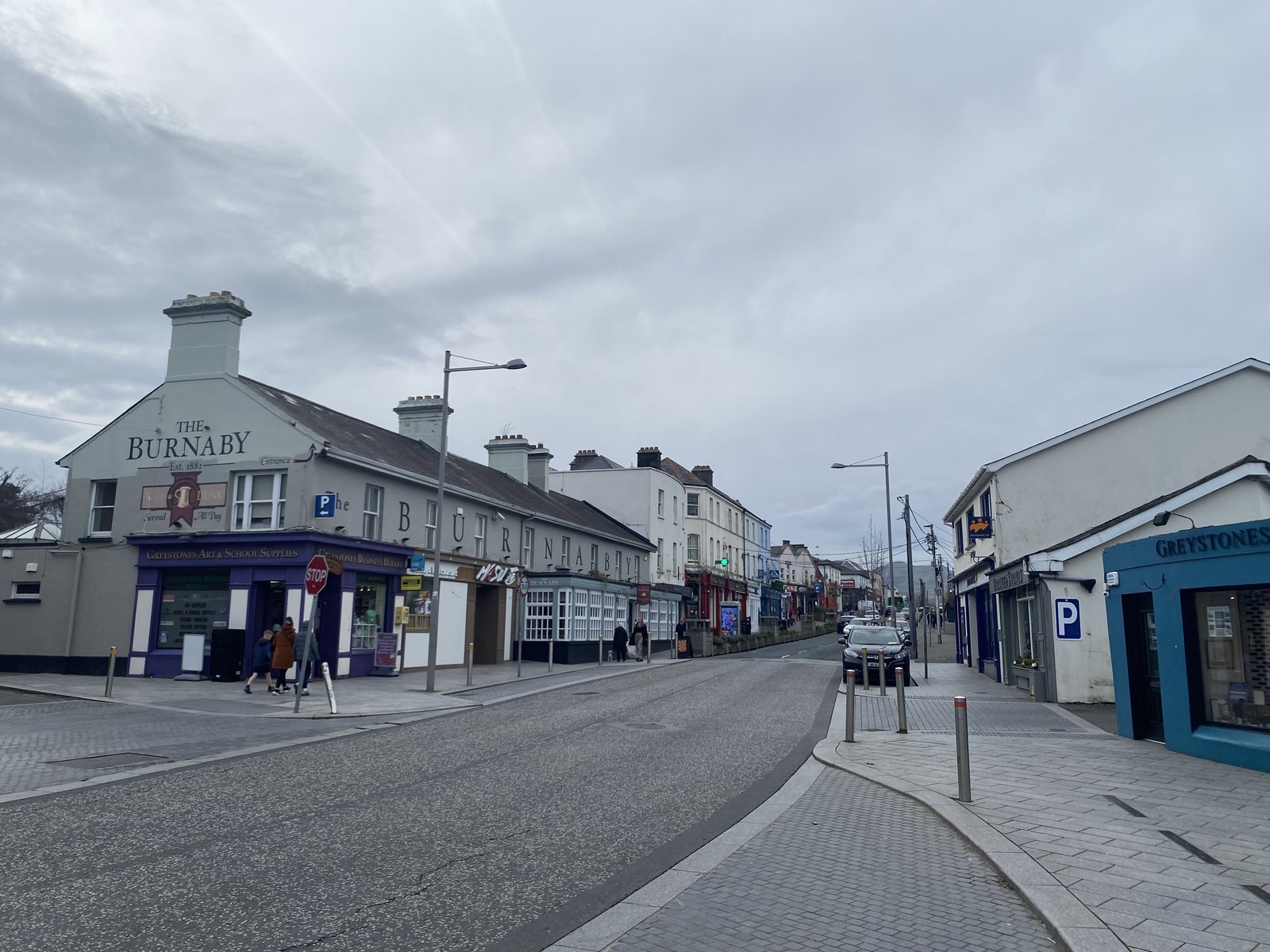 Church Road, Greystones, lined with shops and restaurants including The Burnaby