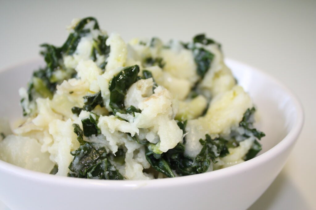 A bowl of Irish colcannon — creamy mashed potato folded with kale, a traditional Irish dish