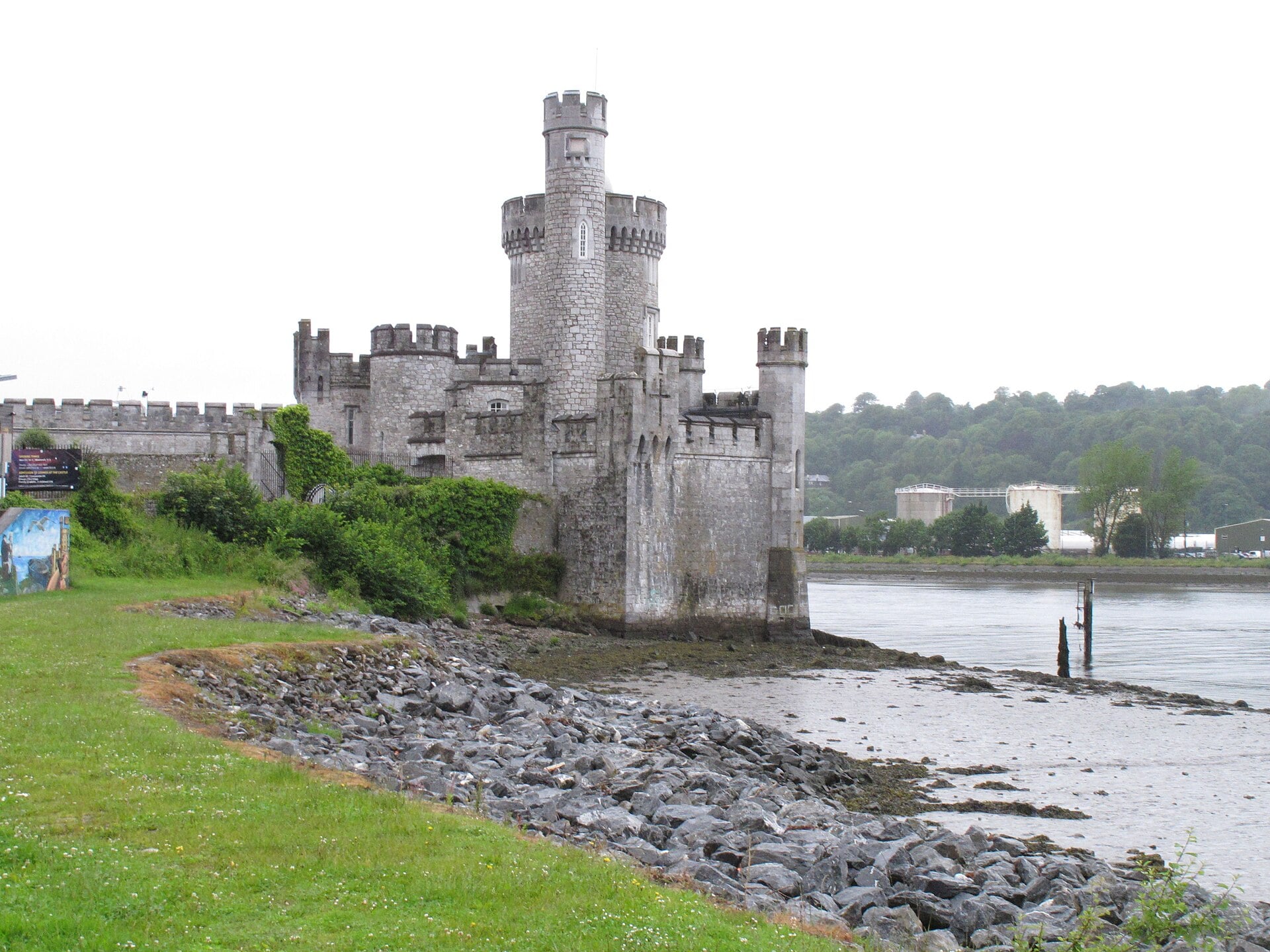 Blackrock Castle on a rocky shoreline of the River Lee in Cork, Ireland, with the observatory dome visible on the round tower