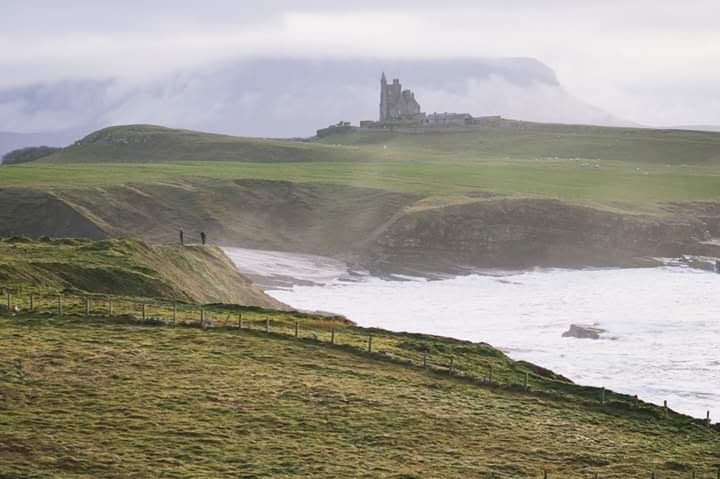 Classiebawn Castle on a coastal headland above cliffs and the Atlantic, Mullaghmore Peninsula, County Sligo