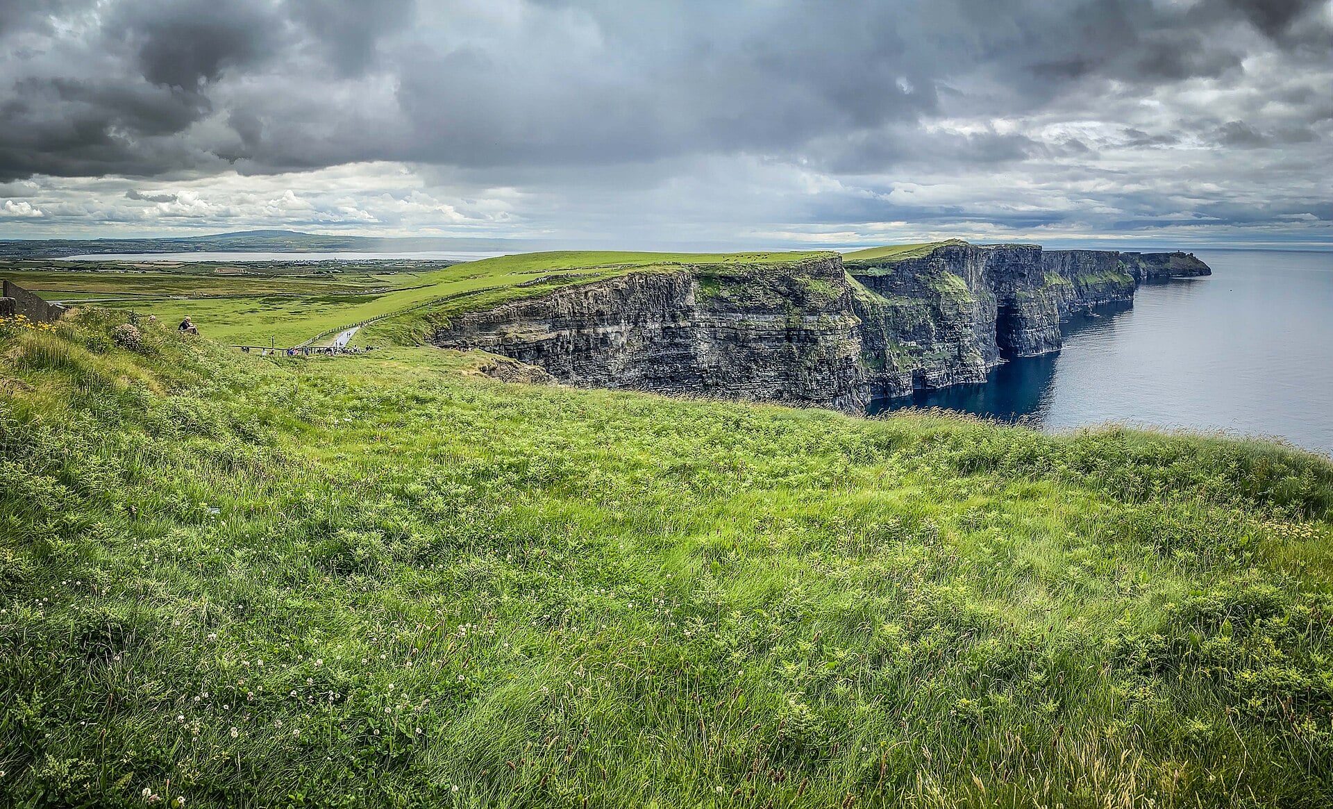 The Cliffs of Moher stretching along the Atlantic coast of County Clare, Ireland