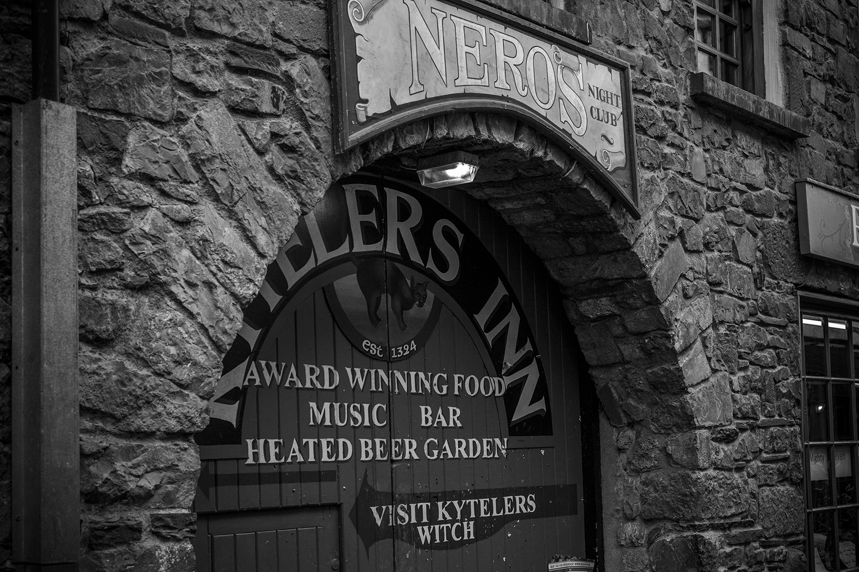 The arched stone entrance to Kyteler's Inn, one of Ireland's oldest pubs, in Kilkenny
