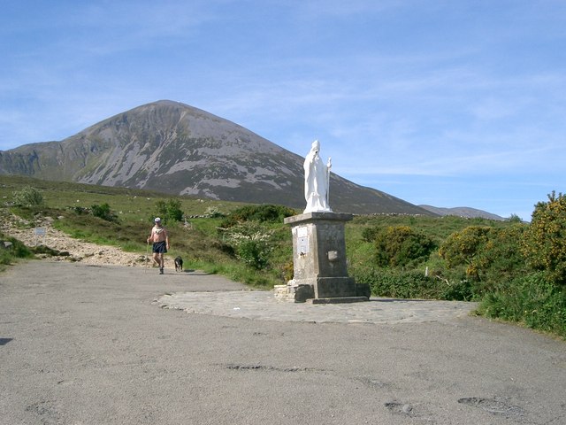 Statue of Saint Patrick at the base of Croagh Patrick, with the mountain rising behind, County Mayo