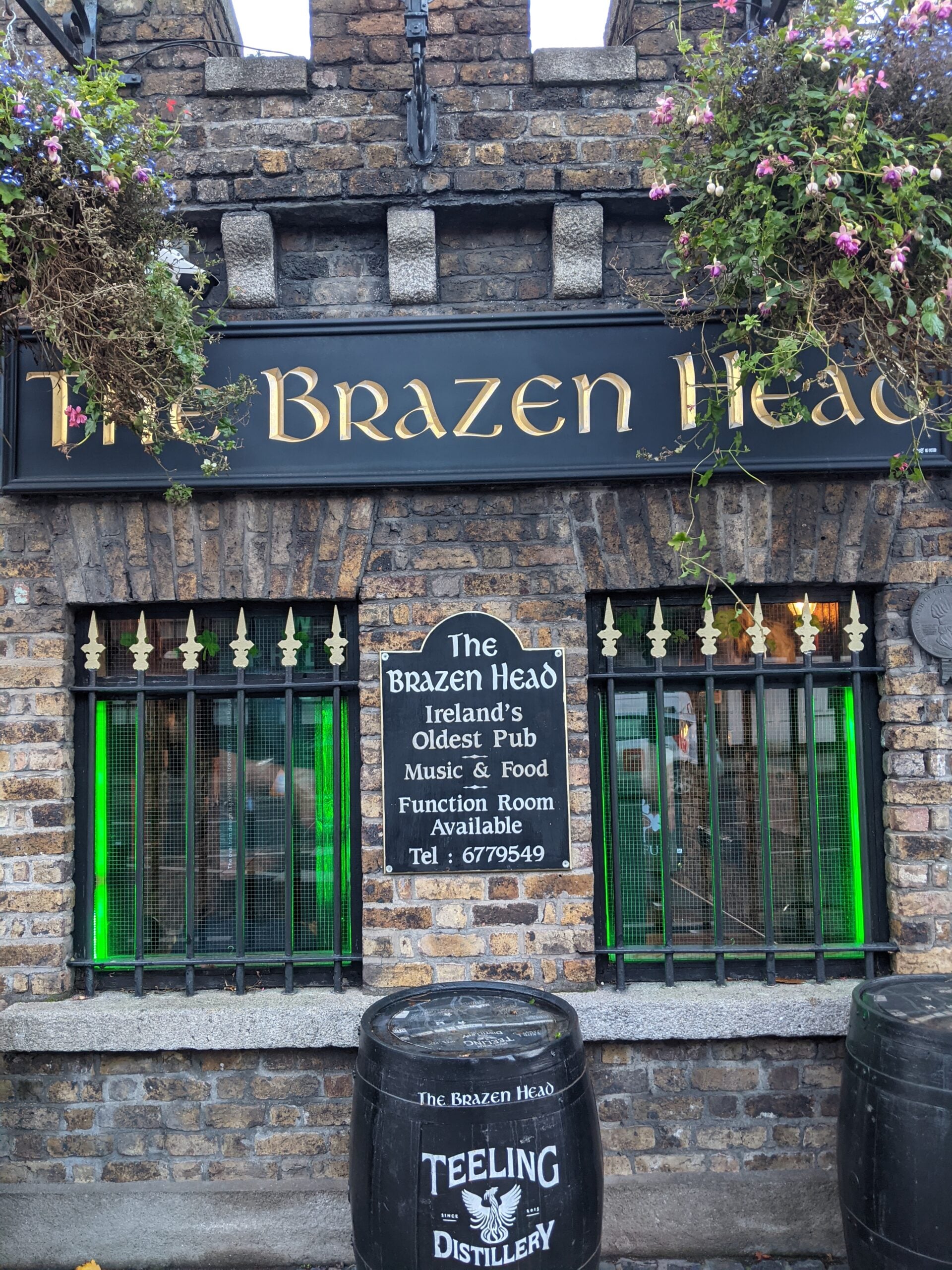 The Brazen Head pub exterior on Bridge Street Lower, Dublin, with its gold signage and Ireland's Oldest Pub plaque