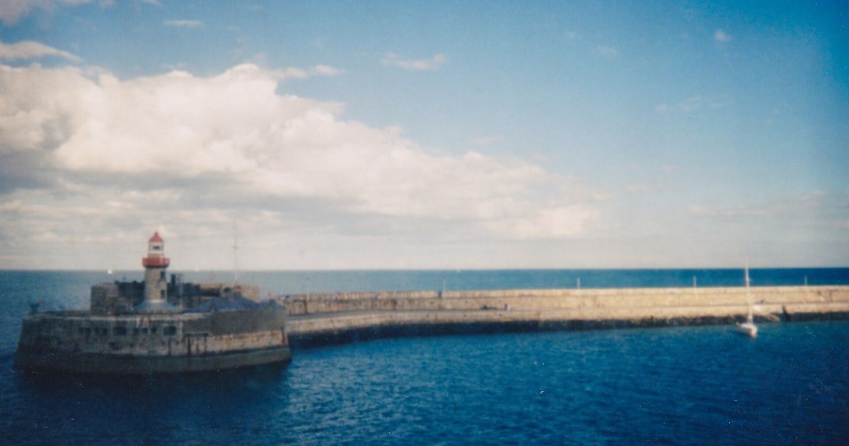 D&uacute;n Laoghaire's East Pier lighthouse, marking the harbour that became the terminus of Ireland's first railway in 1834