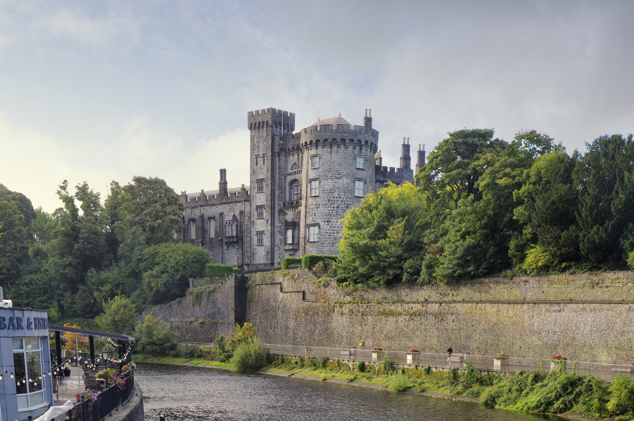 Kilkenny Castle's Norman towers and battlements above the River Nore, Kilkenny