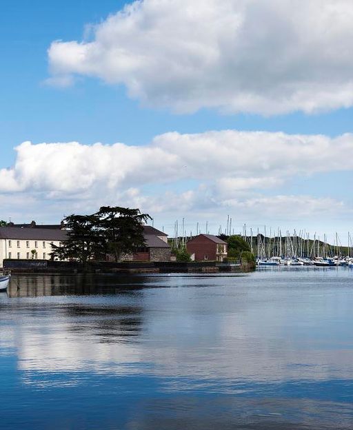 Kinsale harbour in County Cork, Ireland, with yachts and waterfront buildings
