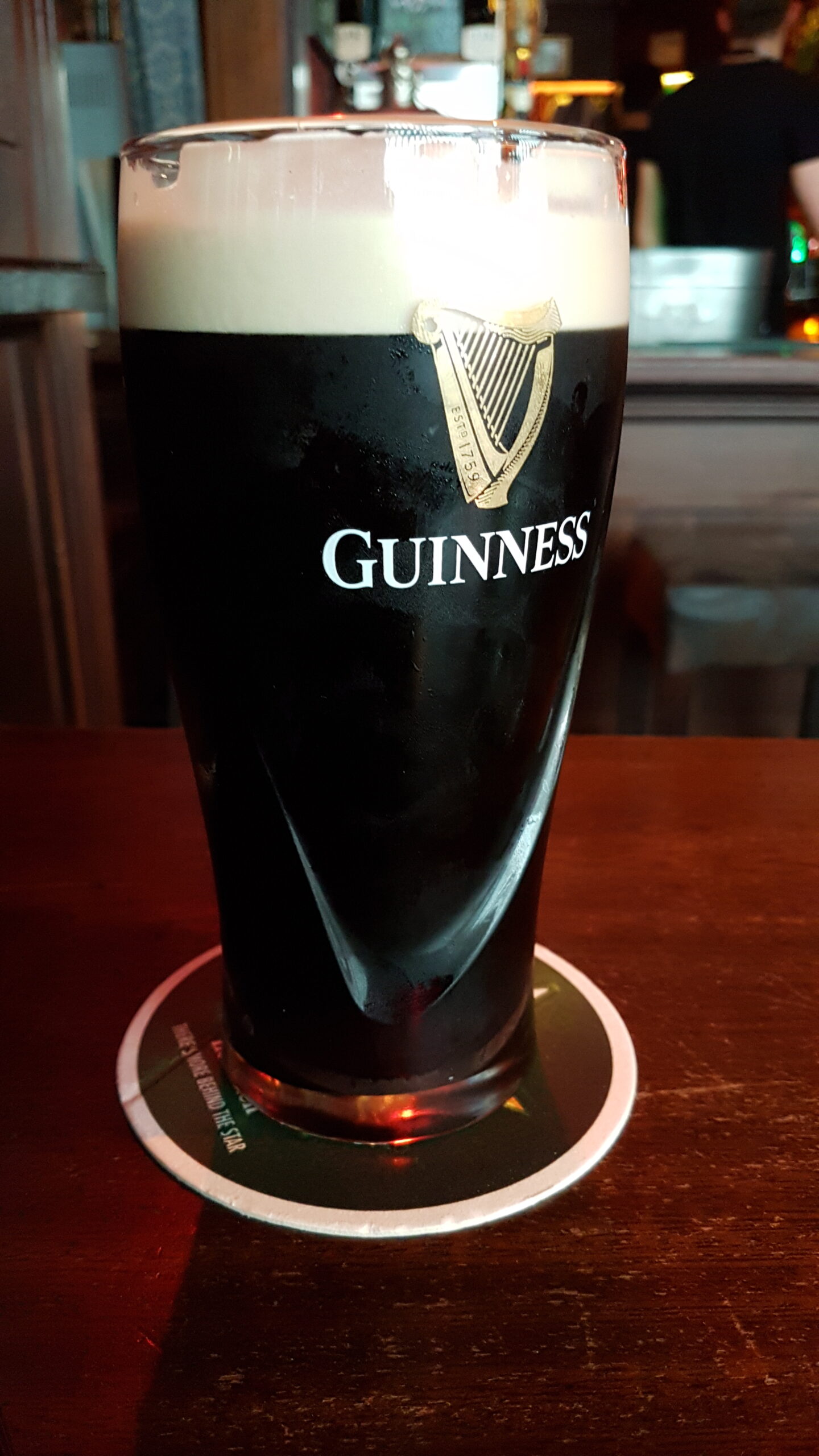 A pint of Guinness freshly poured at a pub in Temple Bar, Dublin, Ireland