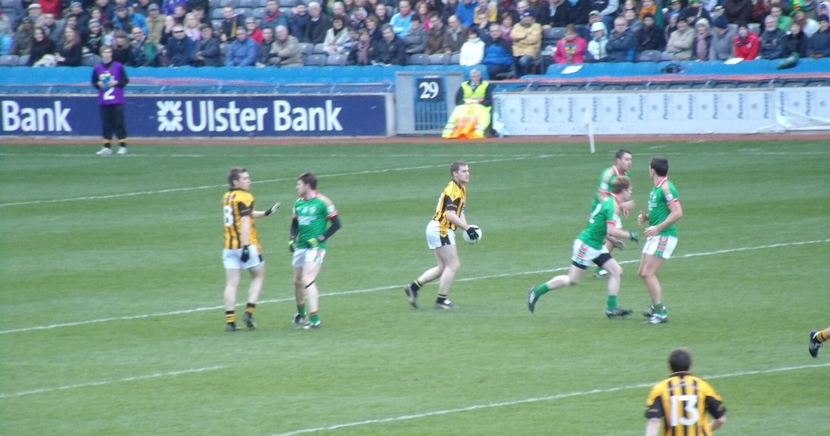 A GAA football match in progress in front of a packed stand, the kind of contest members risked suspension merely for watching under Rule 27