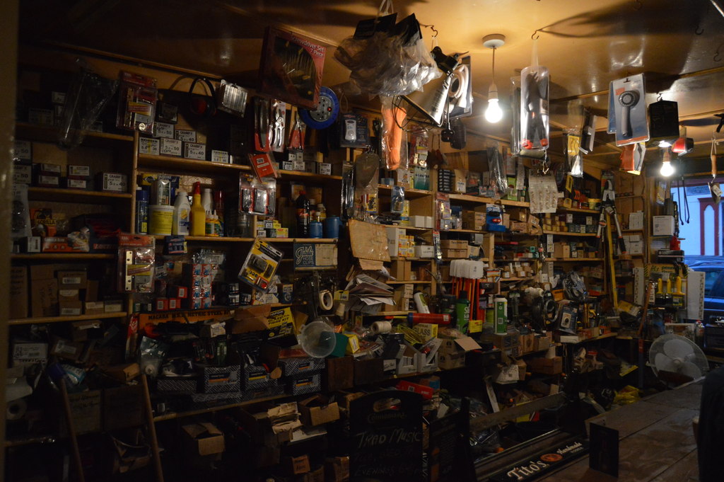 Densely packed shelves of hardware stock inside Foxy John's, a combined pub and hardware shop on Main Street, Dingle, County Kerry