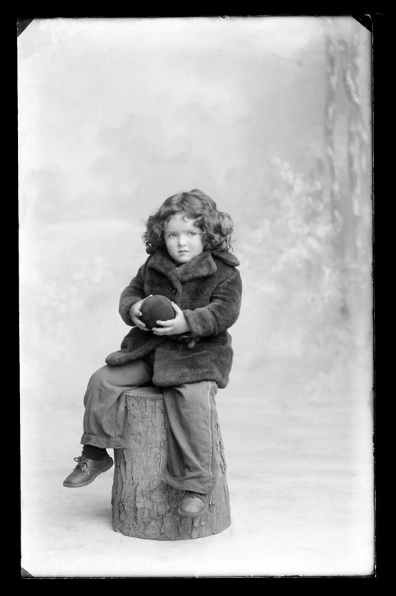 Vintage family portrait glass-plate photograph from the Public Record Office of Northern Ireland archives, the kind of family-history record genealogy researchers search for