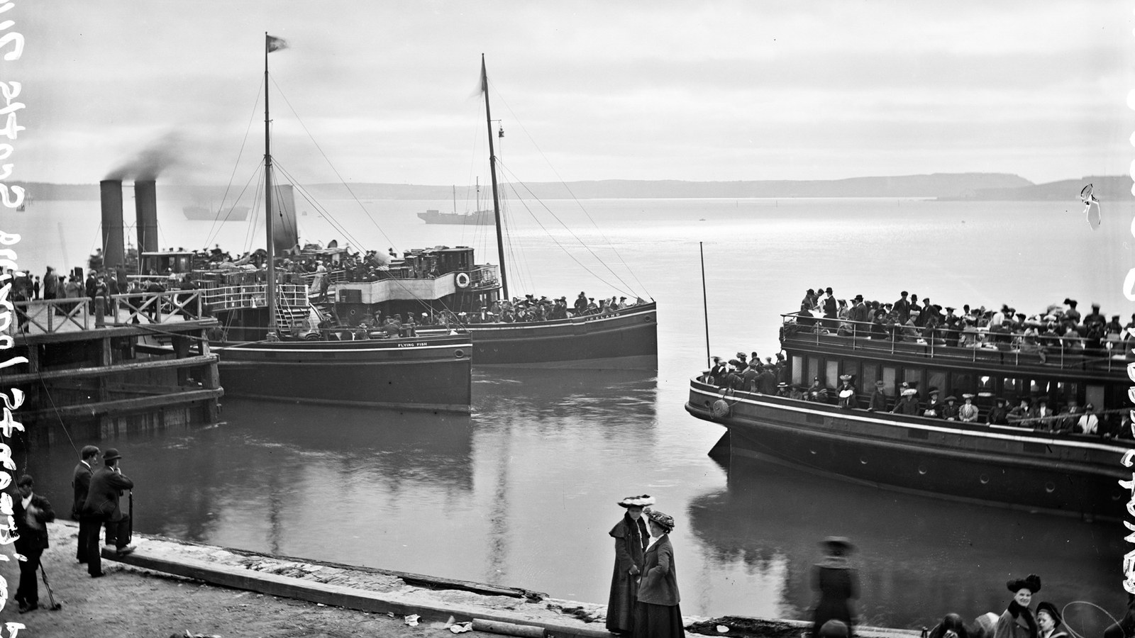 Emigrants boarding the tenders at Queenstown, now Cobh, in County Cork, in an old photograph