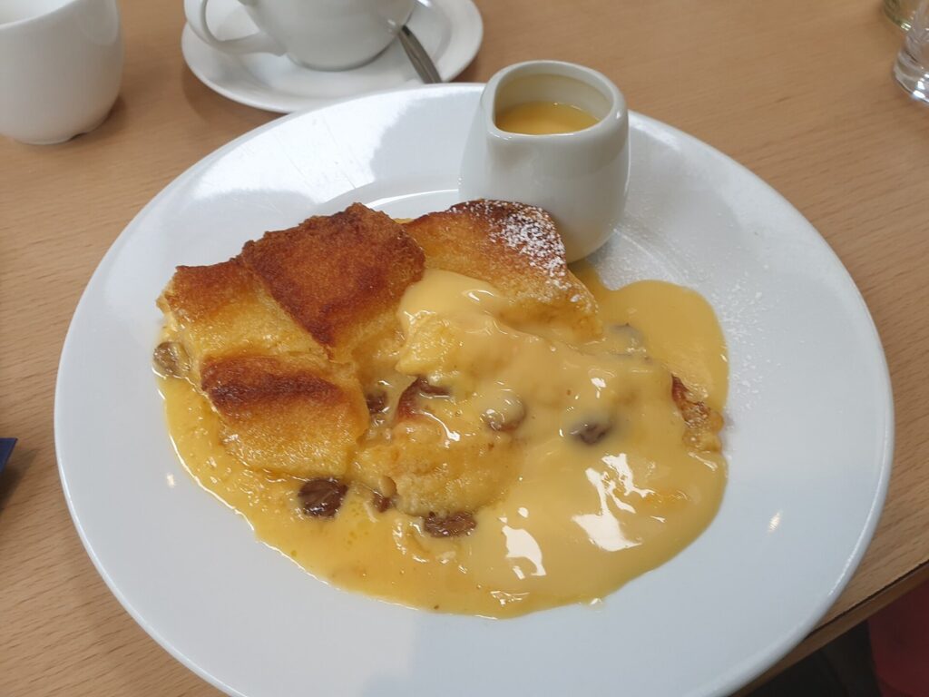 Bread and butter pudding with custard