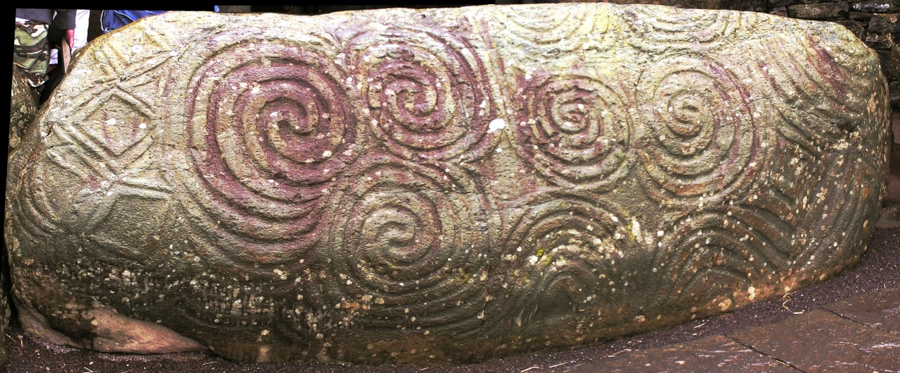 Close-up of the triple-spiral carvings on the entrance kerbstone at Newgrange, County Meath, Ireland