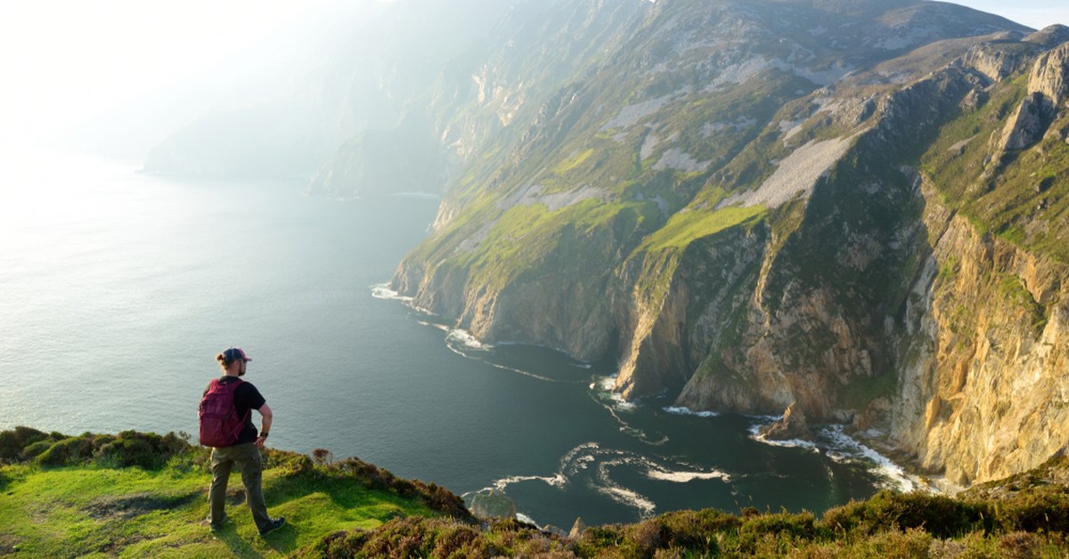 Walker above the Slieve League sea cliffs, County Donegal