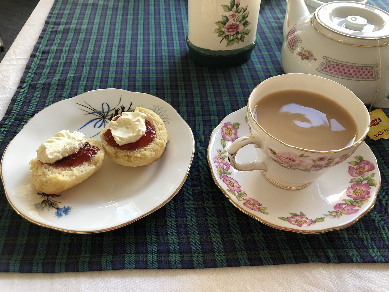 Freshly baked scones with jam and cream